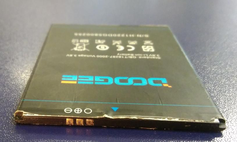 Doogee Kissme DG580 - аккумулятор ( батарея ) б/у - фото фото фото 0