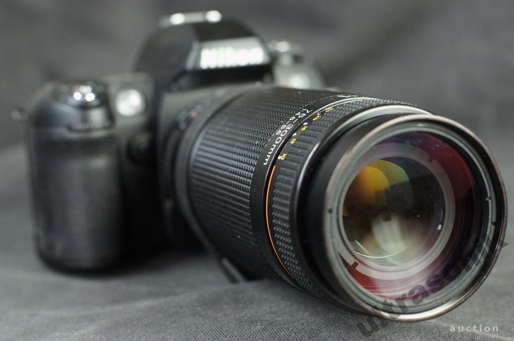 Об'єктив Nikon телеобъектив AF Nikkor 75-300mm 1:4.5-5.6 Ф62mm Japan Вживане - фото фото фото 0
