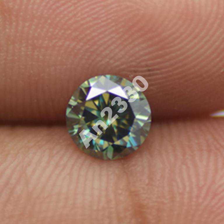 Зелёный бриллиант 0,74 ct 5.90 мм VS2 - фото фото фото 0