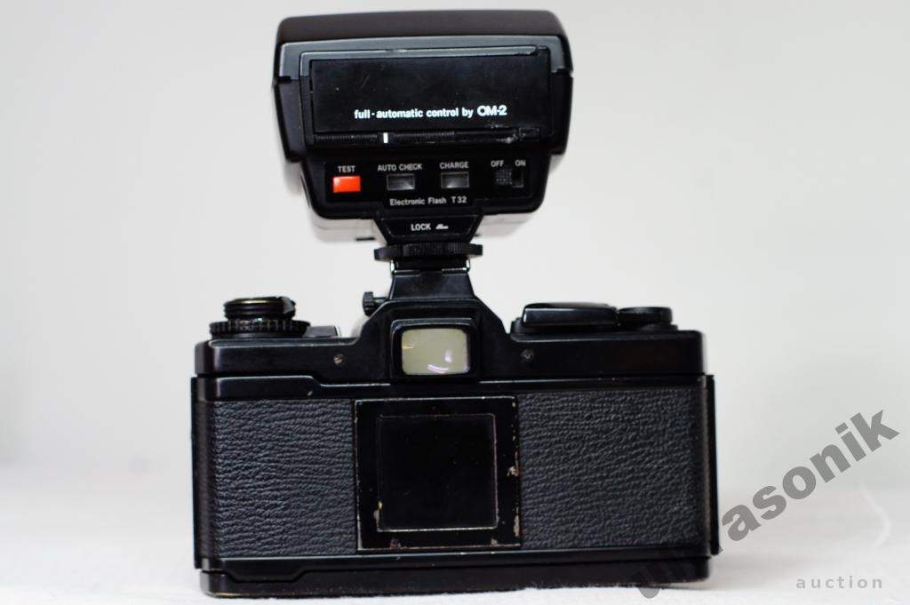 Пленочный фотоаппарат Olympus OM-4 + Zuiko 50mm/1.8 MC + вспышка T32 Вживане - фото фото фото 4
