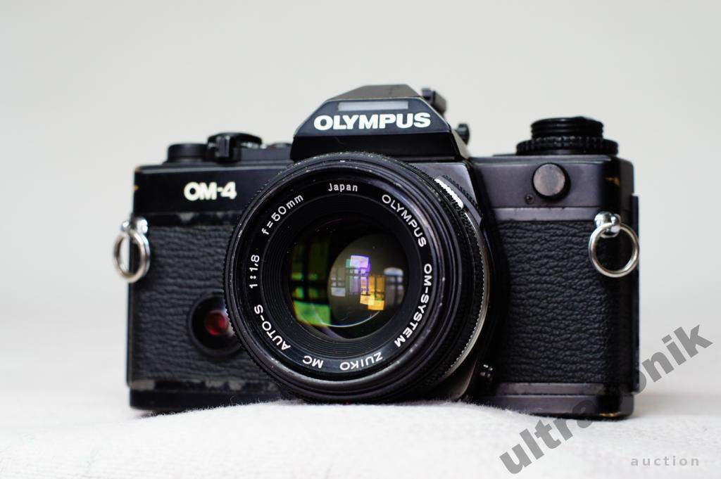 Пленочный фотоаппарат Olympus OM-4 + Zuiko 50mm/1.8 MC + вспышка T32 Вживане - фото фото фото 2