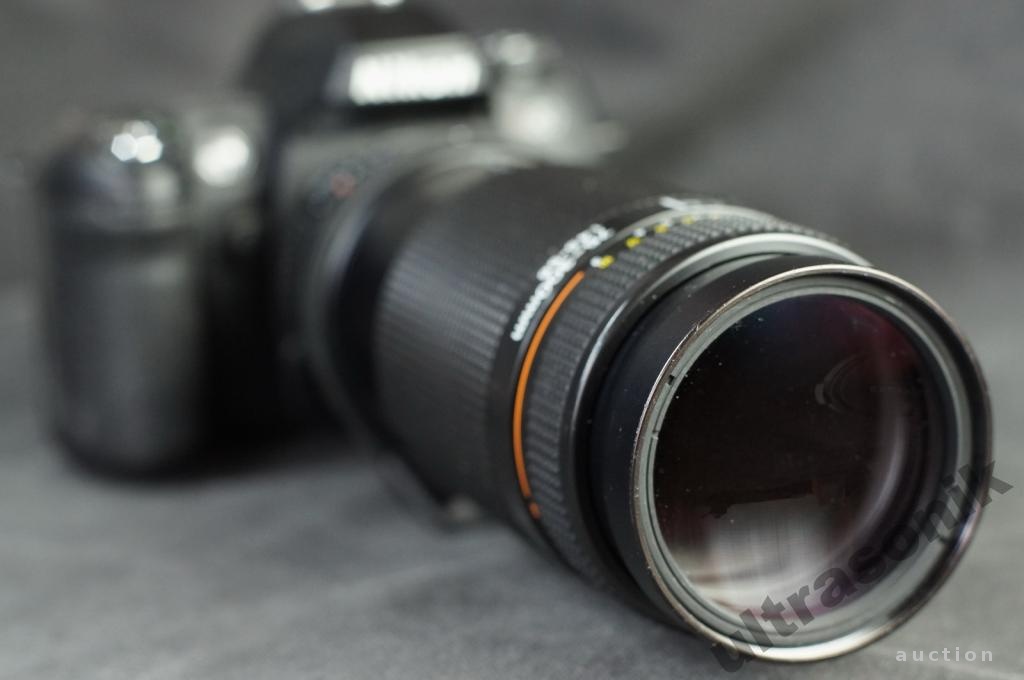 Об'єктив Nikon телеобъектив AF Nikkor 75-300mm 1:4.5-5.6 Ф62mm Japan Вживане - фото фото фото 1