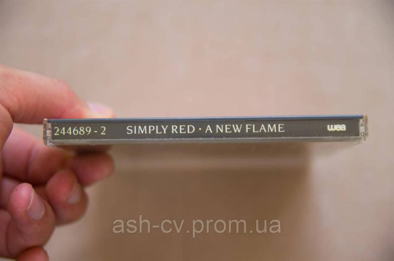 Музичний диск CD. SIMPLY RED - A NEW FLAME (1989) - фото фото фото 3