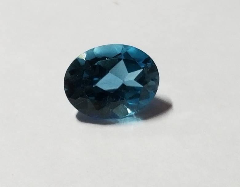 Топаз  Natural London Blue Topaz 2.28ct 9x7mm - фото фото фото 2