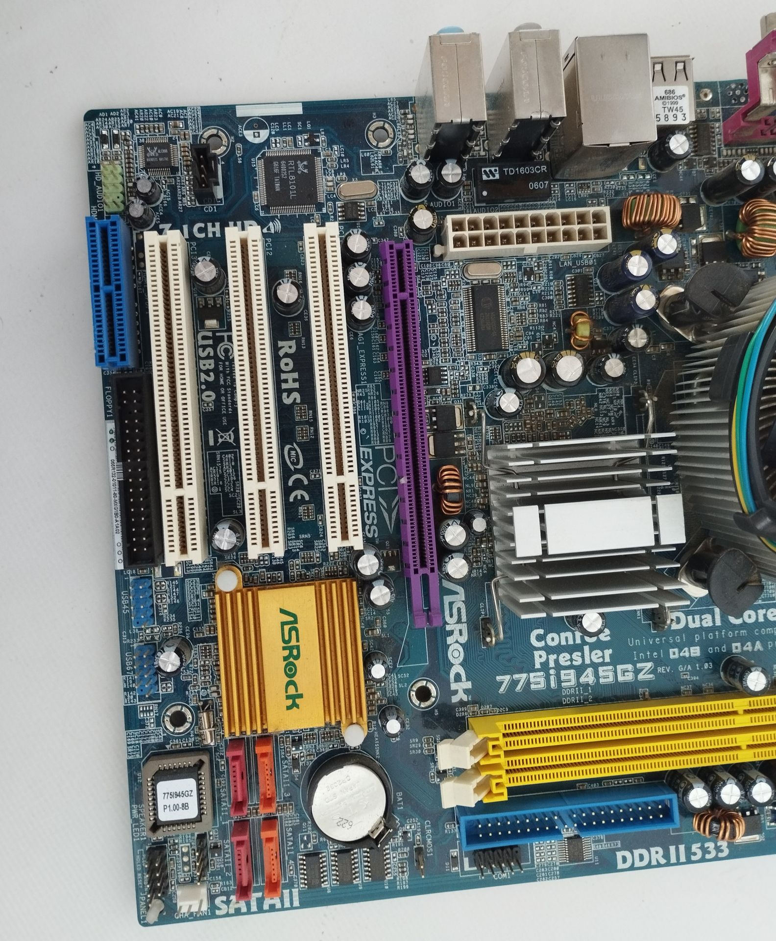 Материнська плата ASRock Conroe 775i945GZ      (Сокет 775)      (№151) - фото фото фото 2