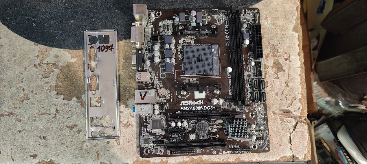 Мат. плата ASRock FM2A68M-DG3+ Socket FM2+ AMD A68H SATA RAID MicroATX 2DDR3 № 240407108 - фото фото фото 0