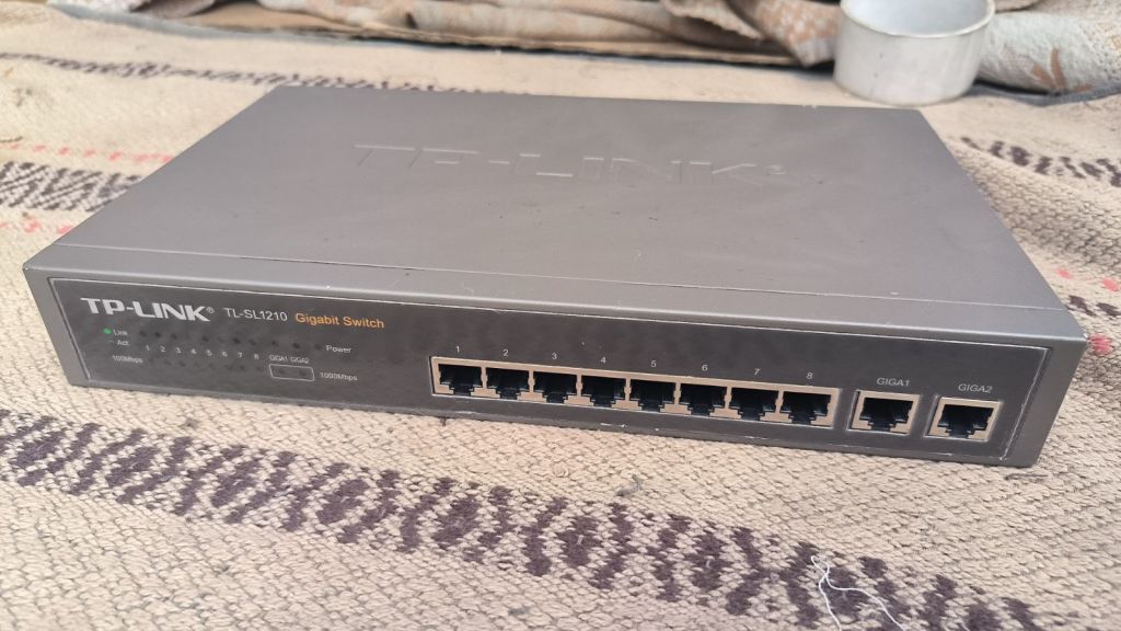 Комутатор TP-LINK TL-SL1210 - фото фото фото 0