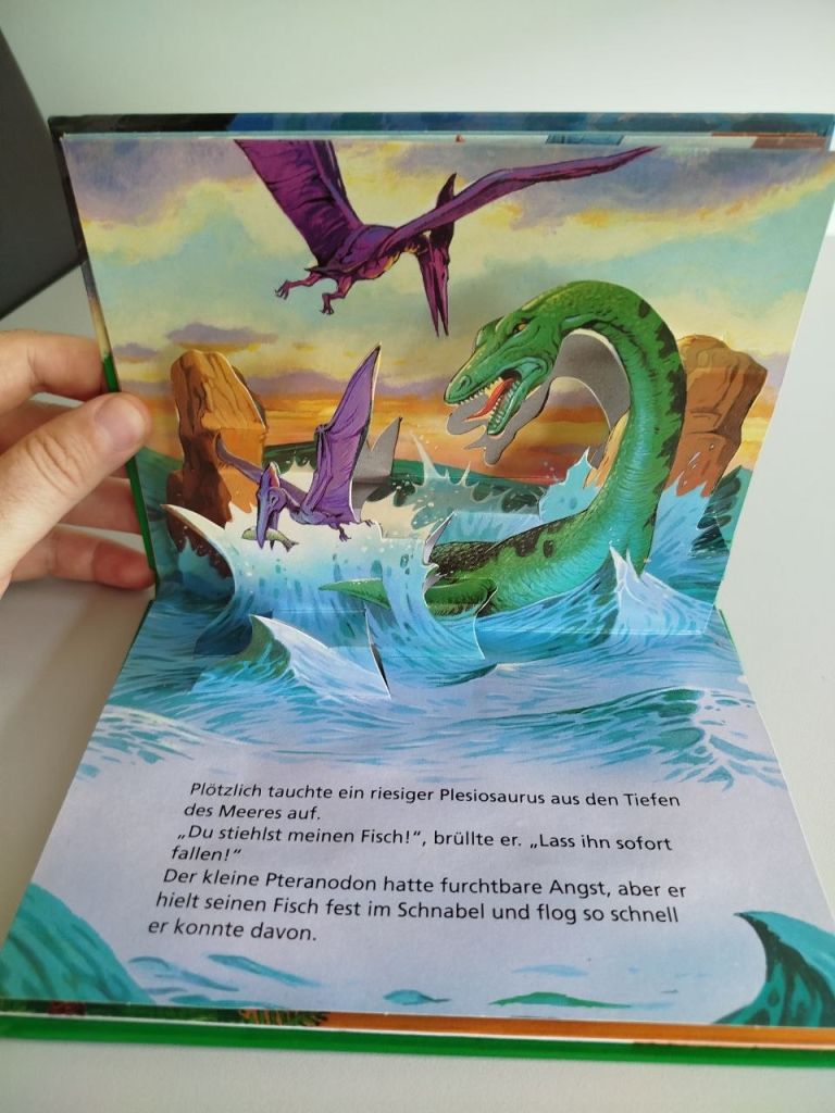 Дитяча книга Pop-Up  (3D) німецькою «Перший політ птеранодона»  (динозаври) - фото фото фото 5