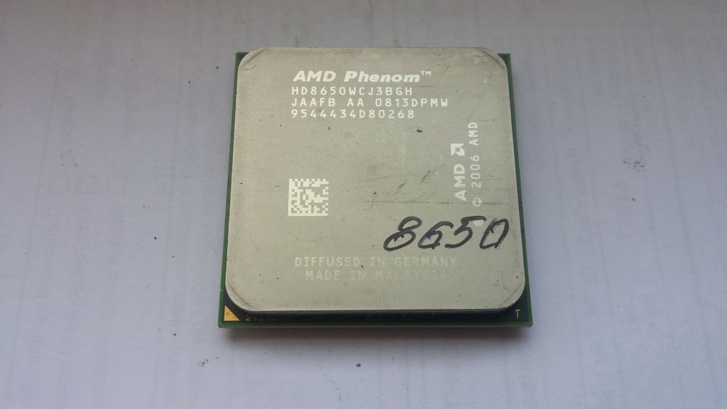 Процессор AMD Phenom X3 8650 2.30GHz/2MB/1800MHz     (HD8650WCJ3BGH) socket AM2+ 95W Вживане - фото фото фото 0