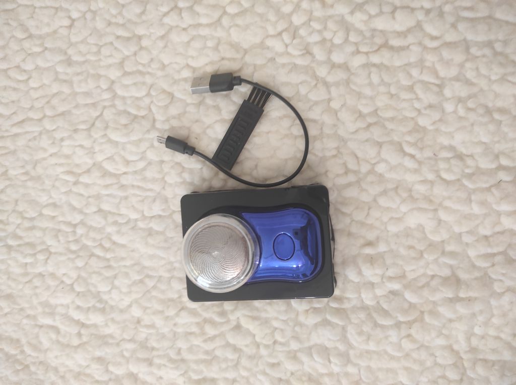 Універсальна L-подібна USB-бритва синього кольору             (Нова) - фото фото фото 0