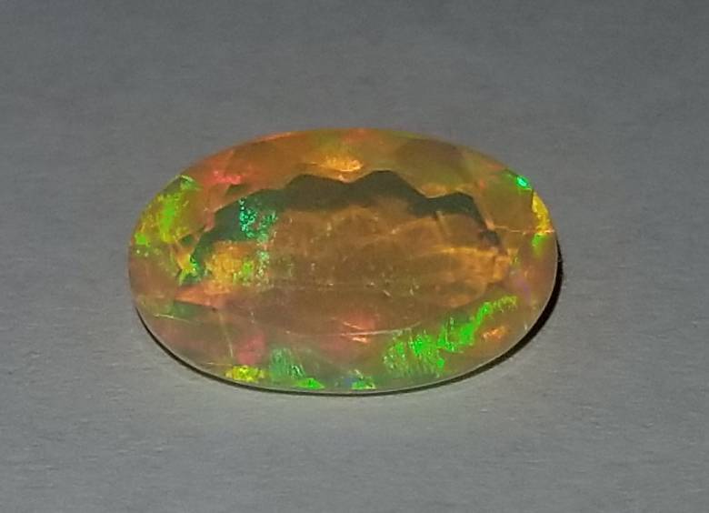 Эфиопский опал 2.06 Ct   12.60 x 7.80 x 4.80 MM - фото фото фото 3