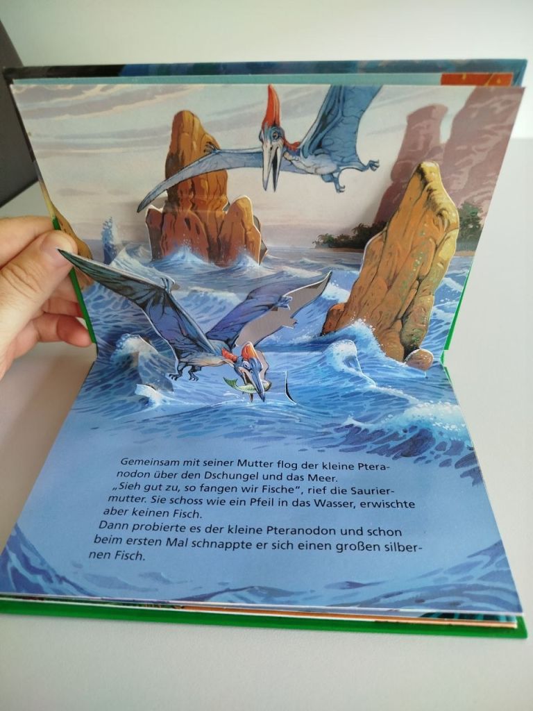Дитяча книга Pop-Up  (3D) німецькою «Перший політ птеранодона»  (динозаври) - фото фото фото 7