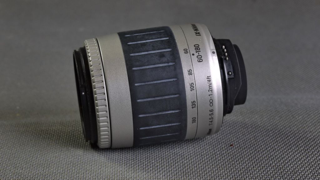 Об'єктив Nikon IX-NIKKOR 60-180mm 1:4-5.6 Ф52mm для камер APS формата Вживане - фото фото фото 3