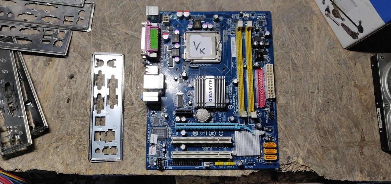 Мат. плата Gigabyte GA-945GCM-S2C rev1.0 LGA775 i945GC PCI-E+SVGA+LAN SATA MicroATX 2DDR2 № К212903 - фото фото фото 0