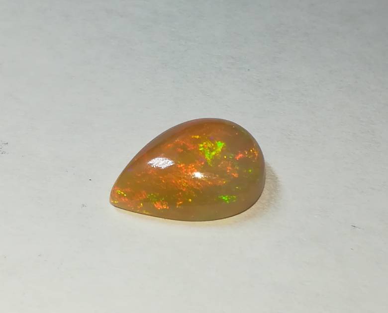 Эфиопский опал кабошон  2.50Ct  12.77 x 9.36 x 5.12 mm - фото фото фото 5