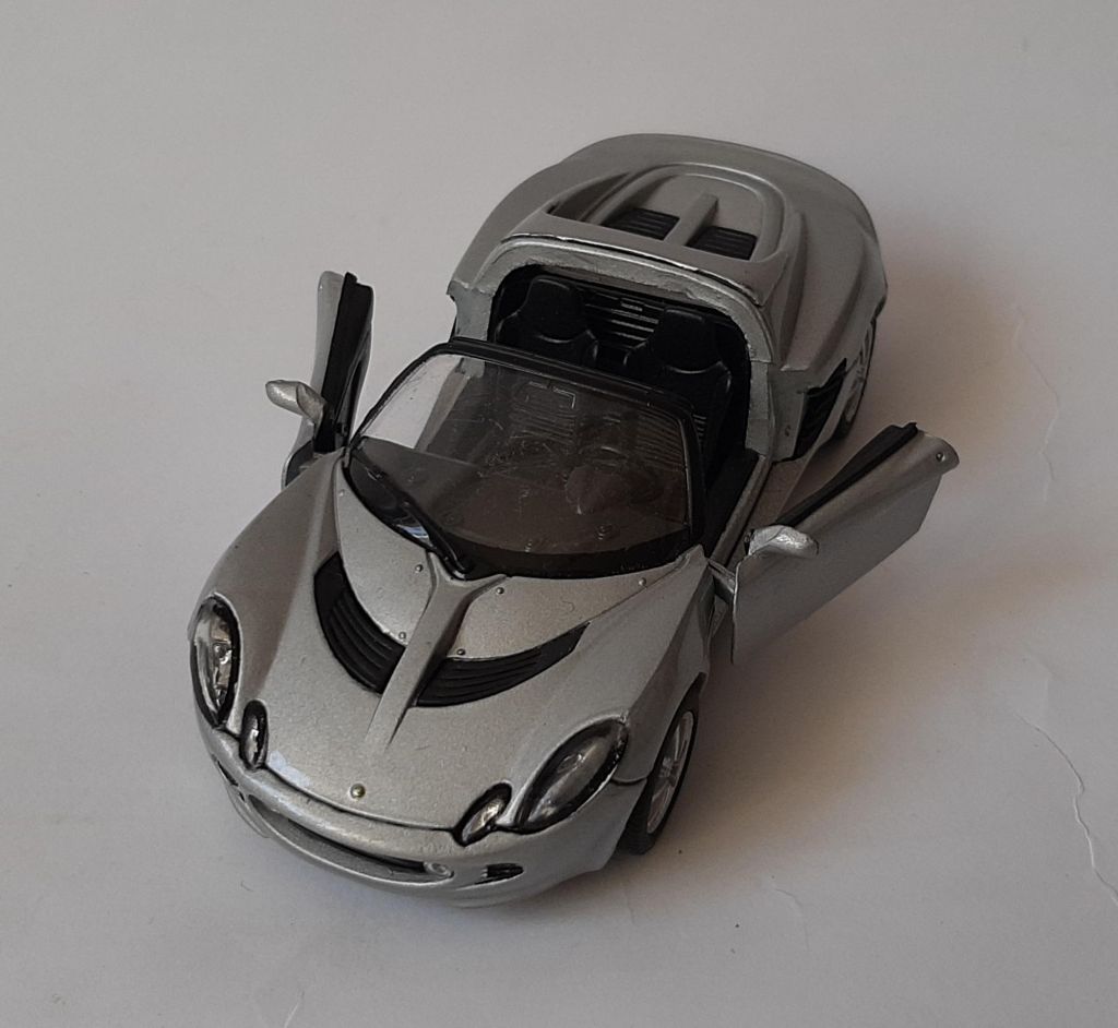 Модель Lotus Elise 111s, 2003г. Welly, номерная модель, масштаб 1:43. - фото фото фото 4