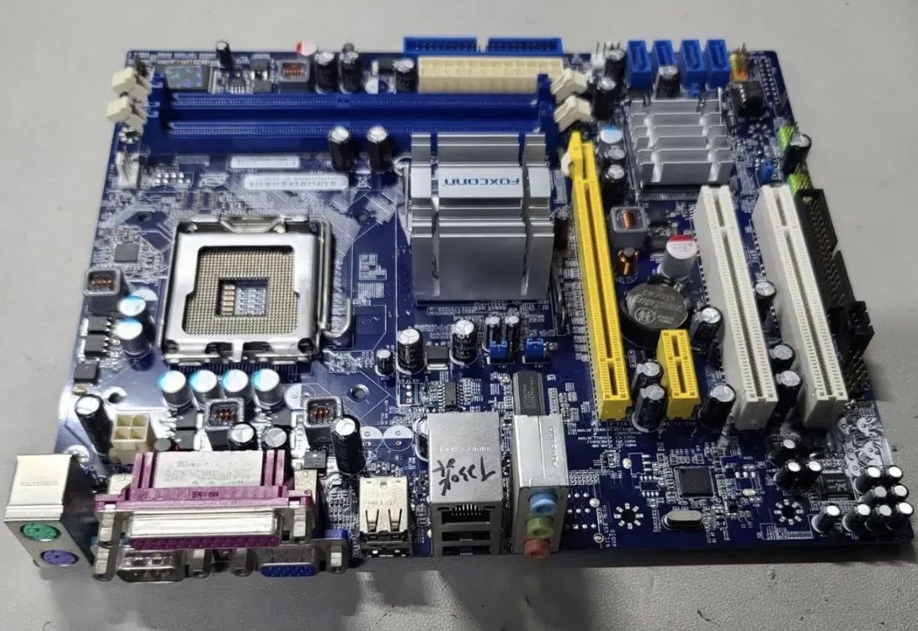 Материнська плата Foxconn G31MX-K      (s775, G31, PCIex16) - робоча - фото фото фото 1