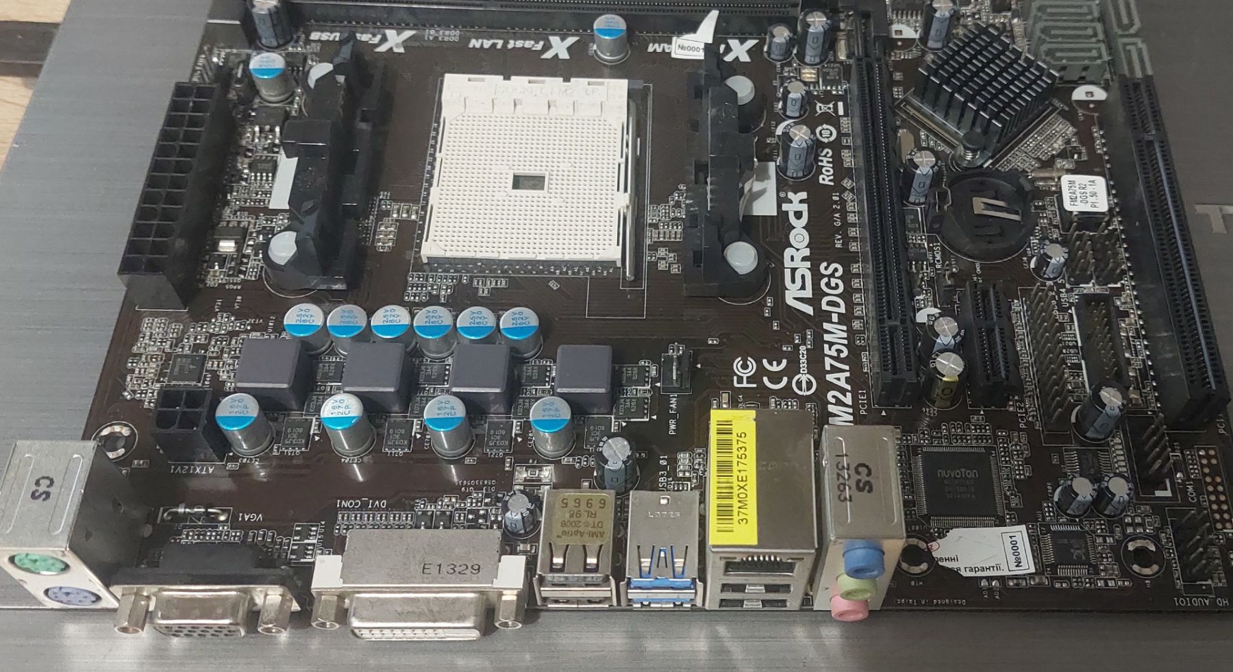Б/В Материнська плата ASRock FM2A75M-DGS Socket FM2/MicroATX/2 x DDR3 - фото фото фото 2