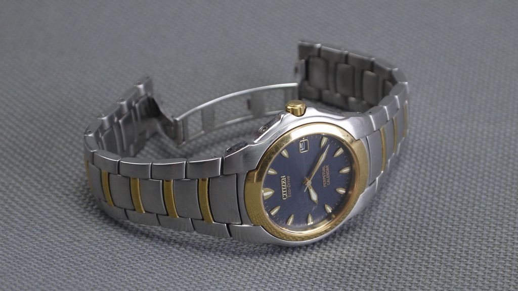 Годинник CITIZEN Eco-Drive Perpetual Calendar 100м. цельнолитая нержавейка синий циферблат model:E710-H24385TA  Вживане - фото фото фото 1
