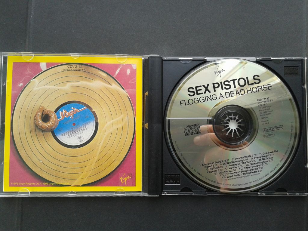 Sex Pistols - Flogging A Dead Horse - фото фото фото 1