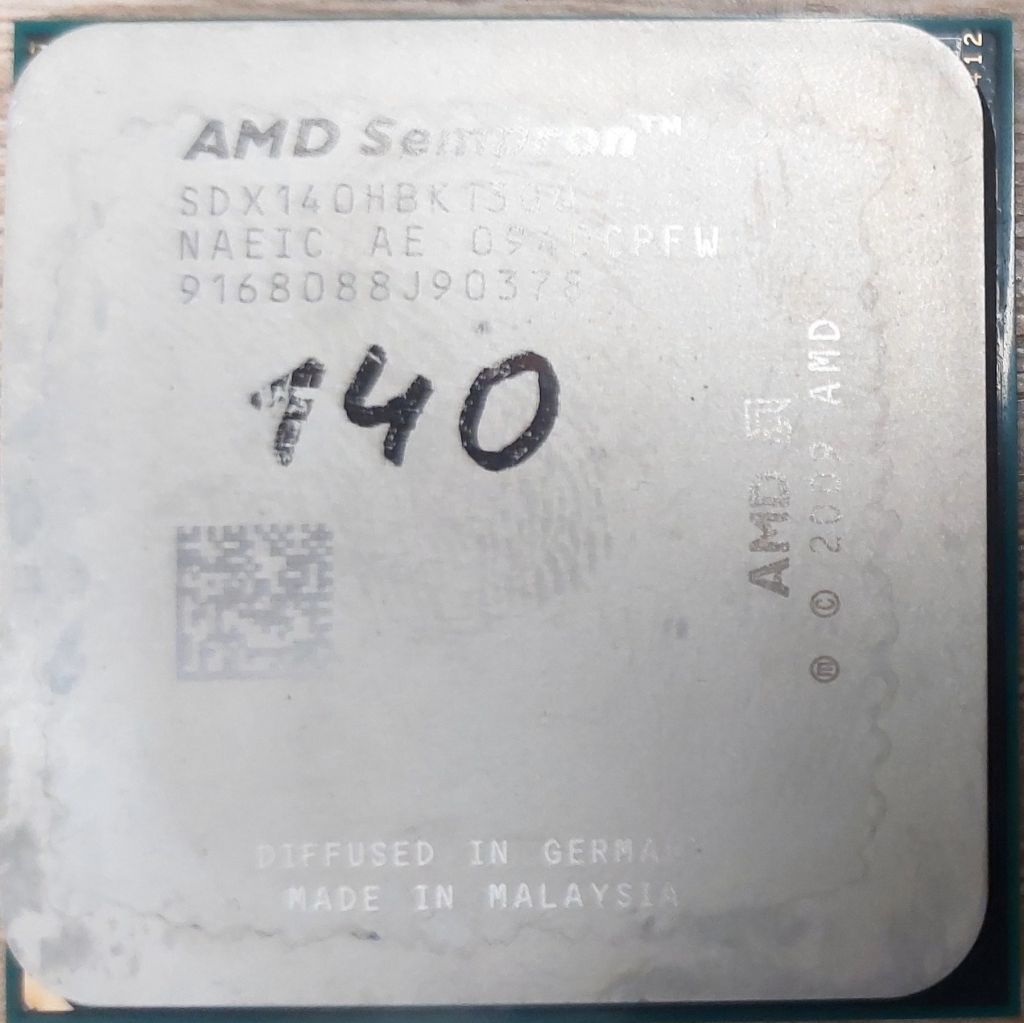 Процесор AMD Sempron 140 2,70GHz/1M/2000MHz   (SDX140HBK13GQ) Socket AM2+/Socket AM3  б/в - фото фото фото 0