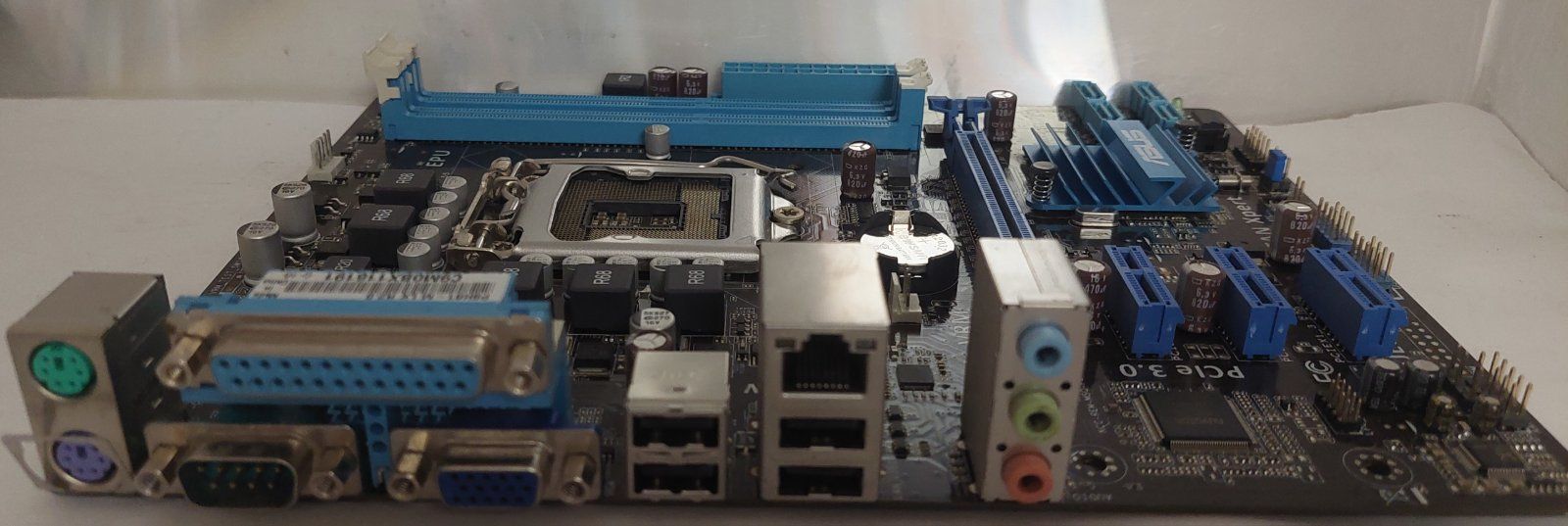 Материнська плата s1155 / ASUS P8H61-M LX3 R2.0 / MicroATX 2x DDR3  б/в - фото фото фото 4