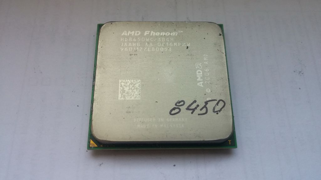 Процессор AMD Phenom X3 8450 2.10GHz/2MB/1800MHz     (HD8450WCJ3BGH) socket AM2+ 95W Вживане - фото фото фото 0