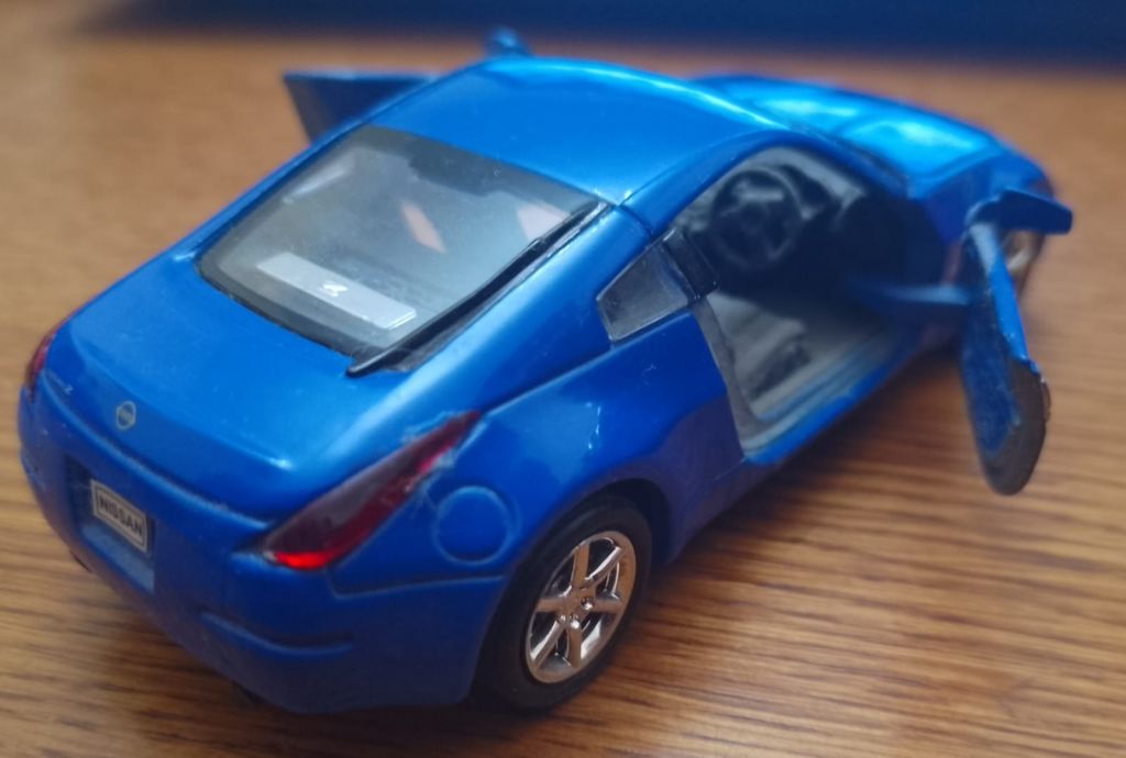 Модель 1:43 NISSAN Z-350. 2003 года, WELLY № 42329 - фото фото фото 4
