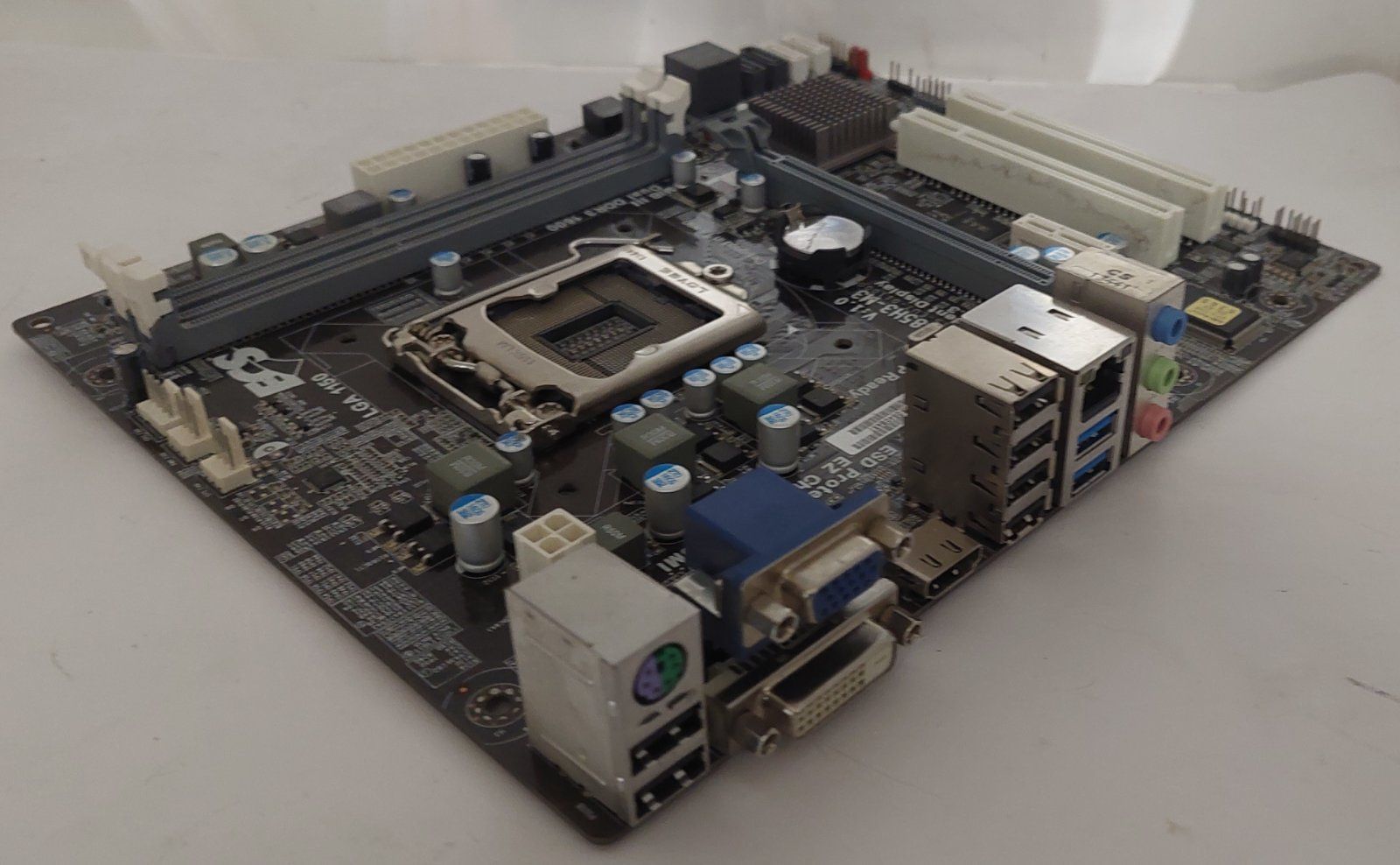 Материнська плата ECS B85H3-M3   (V1.0) / LGA 1150 / Micro ATX/2*DDR3  б/в - фото фото фото 0