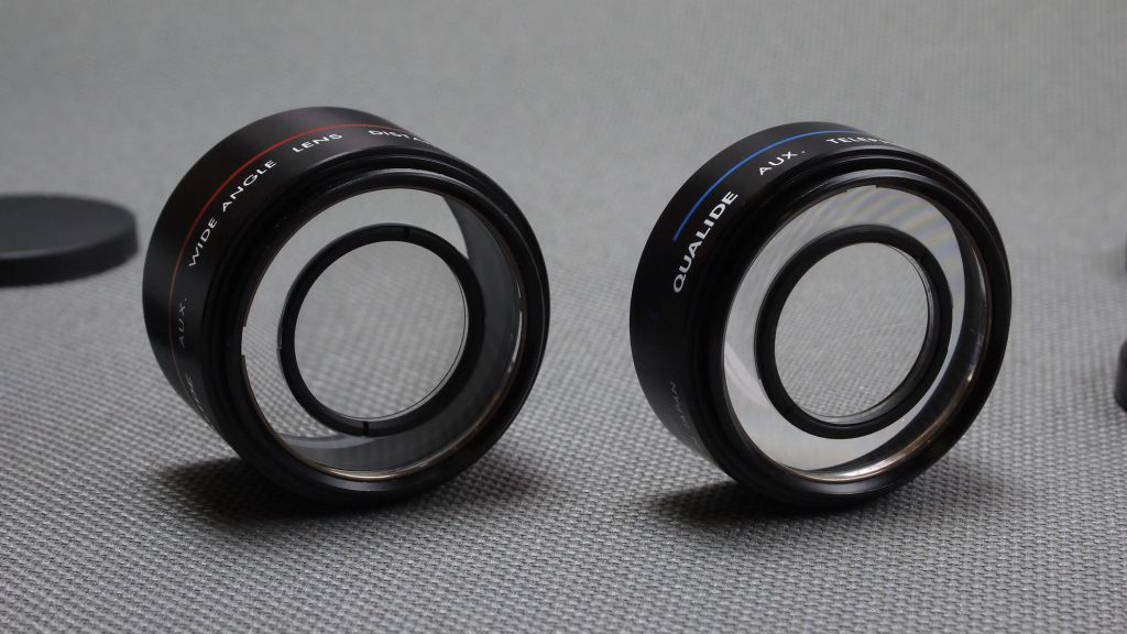 Комплект оптических насадок широкоугольной и телеоптики QUALIDE AUX для камер Nikon L35AF Вживане - фото фото фото 4