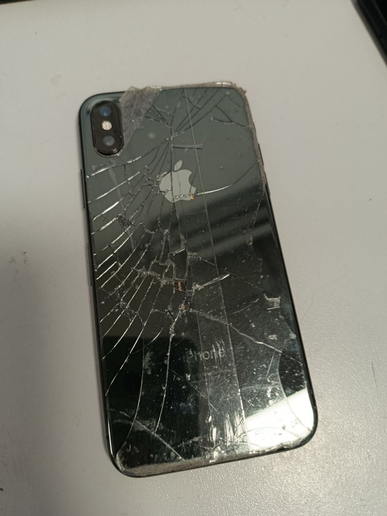 Смартфон Apple iPhone X — бита матриця  (смуги), висить на яблучку - фото фото фото 1