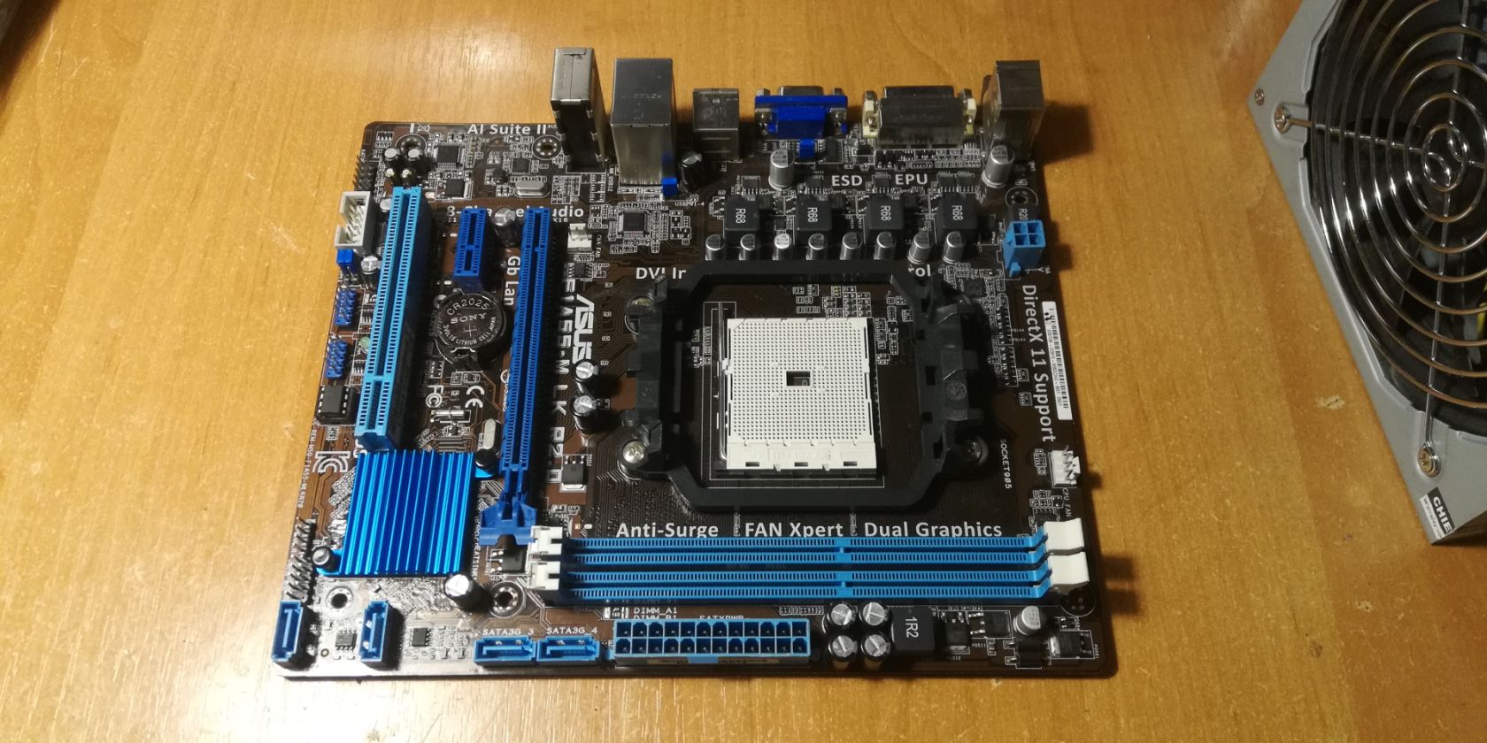 Asus F1A55-M LK R2.0   (sFM1, AMD A55, PCI-Ex16)#3 - фото фото фото 0