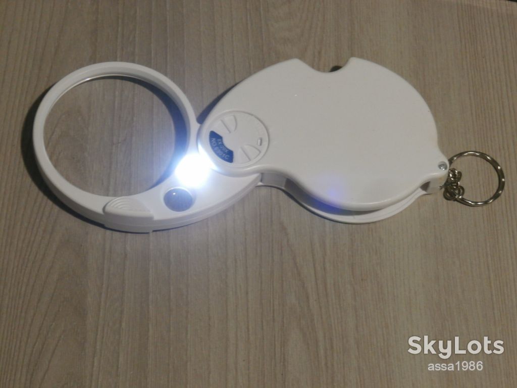 Лупа кишенькова складна Magnifier з підсвічуванням 6901C Збільшеня 4х60 та 20х12 крат - фото фото фото 0