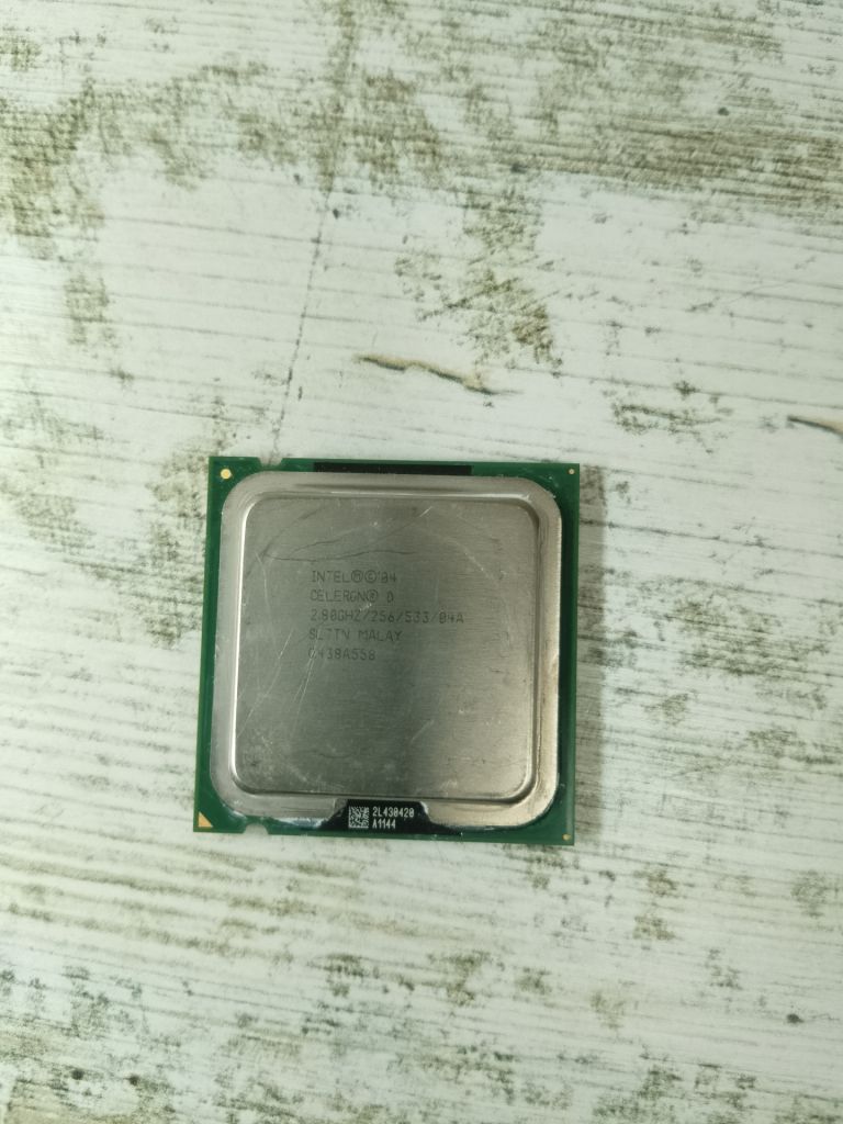 Intel Celeron D 335 2.80 GHz/256/533   (SL7TN) s775 #69 - фото фото фото 0
