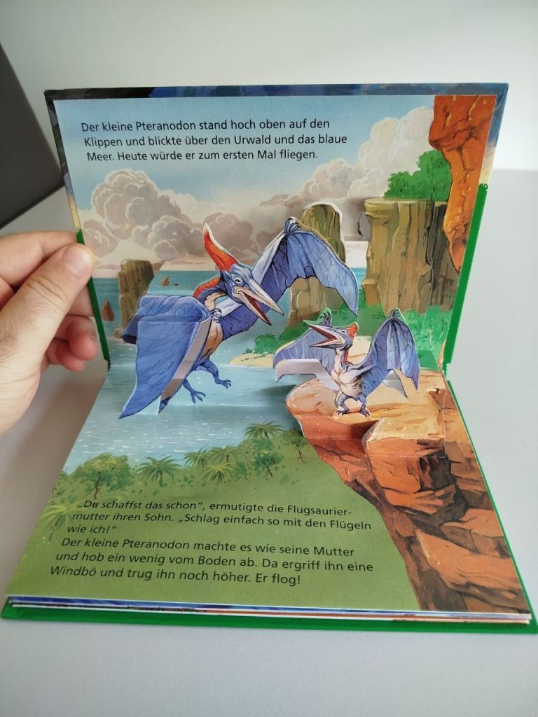 Дитяча книга Pop-Up  (3D) німецькою «Перший політ птеранодона»  (динозаври) - фото фото фото 6