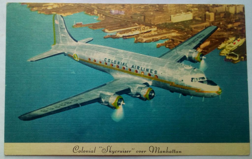 Открытка Самолет Colonial Skycruiser Over Manhattan  (USA) - фото фото фото 0