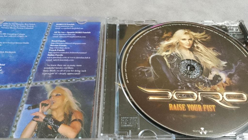 doro - raise your fist. новый лицензионный cd - фото фото фото 3