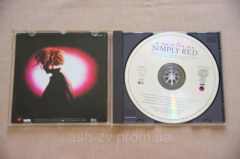 Музичний диск CD. SIMPLY RED - A NEW FLAME (1989) - фото фото фото 5