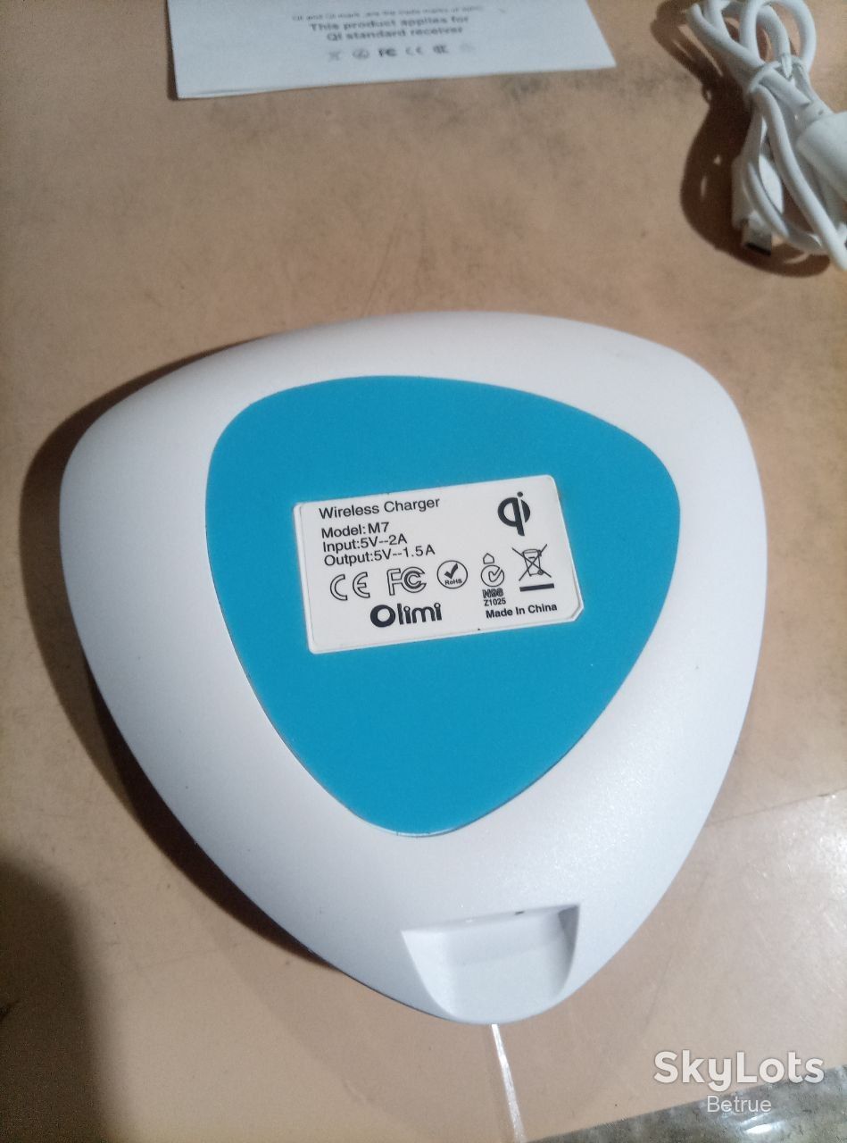 Бездротовий зарядний пристрій Olmi M7 Qi для смартфонів 5V/1.5A White/Blue    (20021) - фото фото фото 8