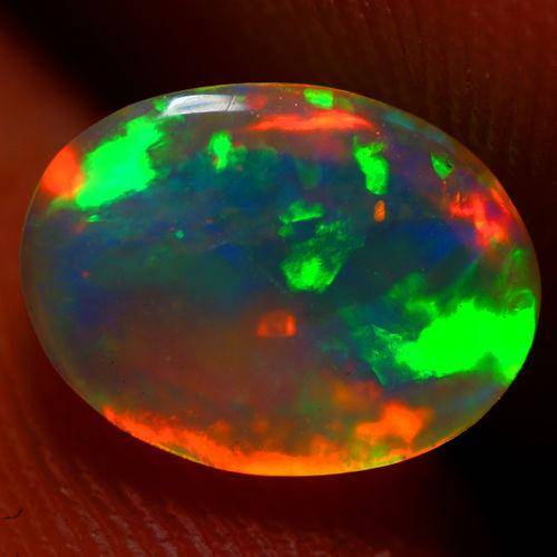 Эфиопский опал кабошон 1.24 CT AAA - фото фото фото 1