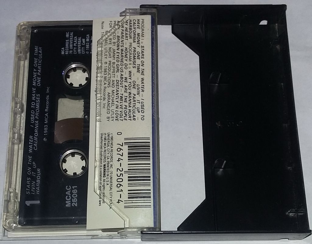 JIMMY BUFFETT One Particular Harbour.  Cassette US - фото фото фото 1