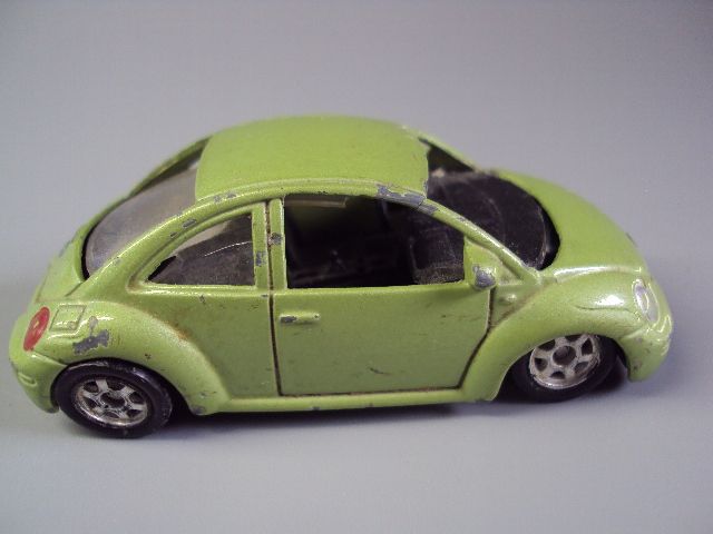 машинка welly volkswagen new beetle Китай фольксваген длина 6,9 см №9479 - фото фото фото 6