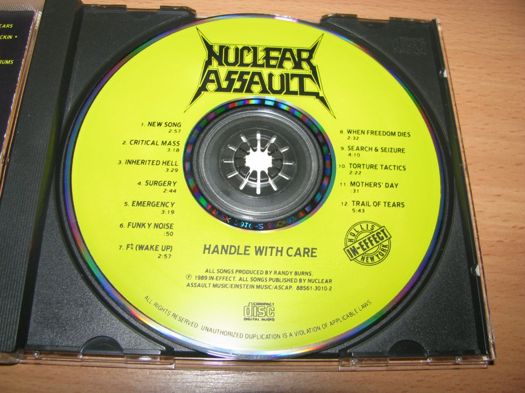NUCLEAR ASSAULT - Handle With Care   (1989 In-Effect 1st press,USA) - фото фото фото 2