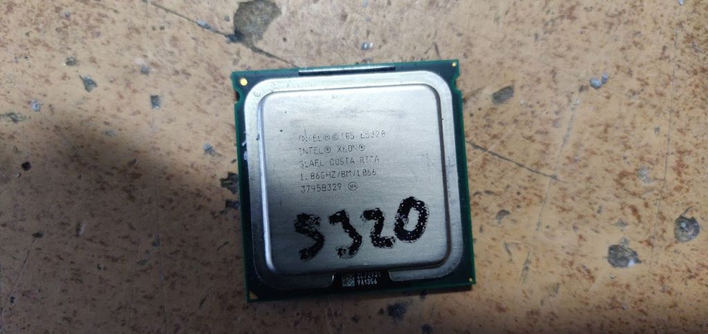 Процессор Intel Xeon E5320 1.86GHz/8M/1066 socket 771 № 210908 - фото фото фото 0
