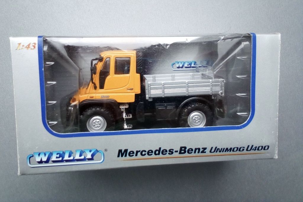 1/43 Welly Mercedes Benz Unimog U400 помаранчевий - фото фото фото 1