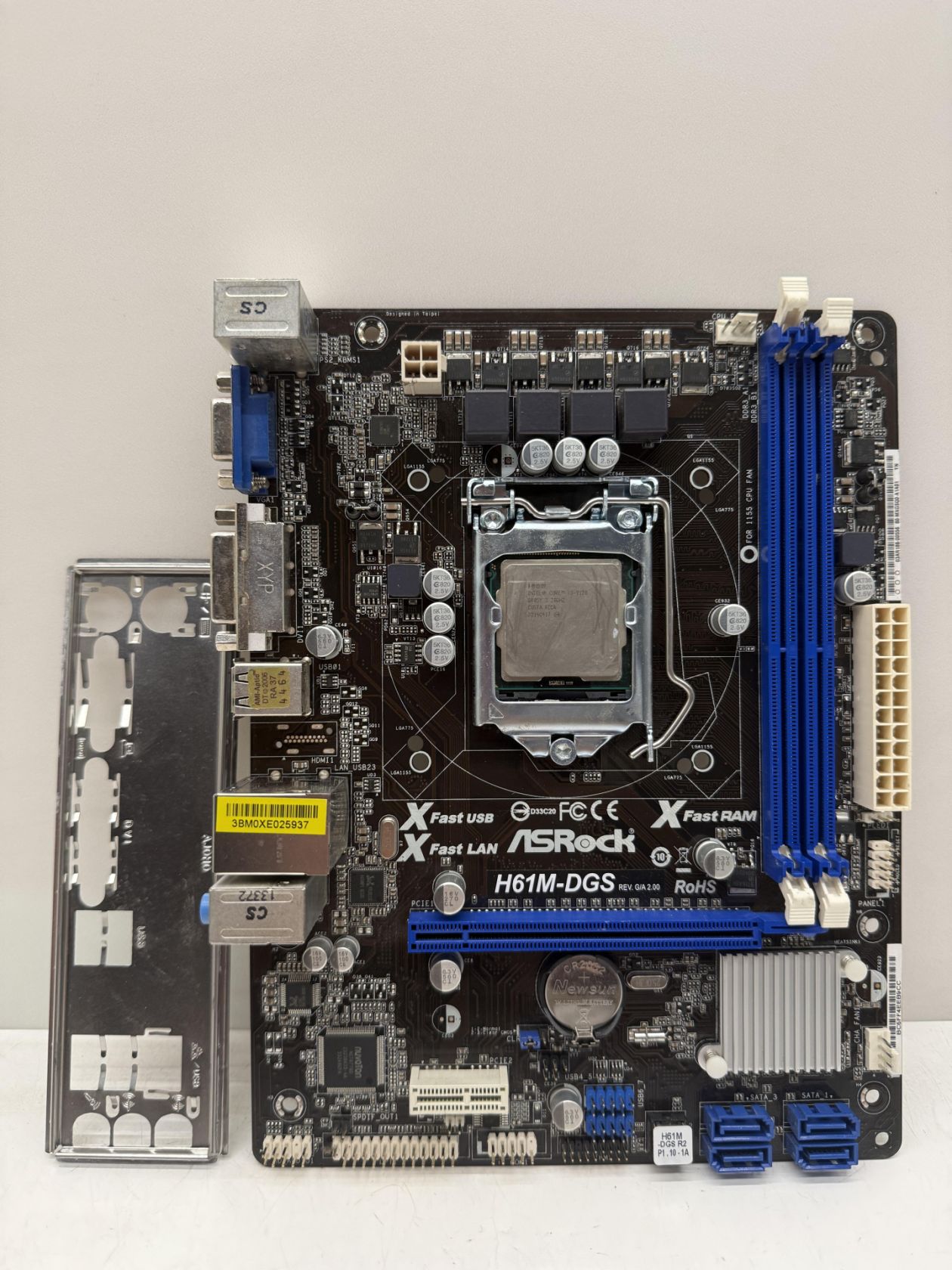 Материнська плата s1155 ASRock H61M-DGS   (Socket 1155,DDR3,б/у) - фото фото фото 0