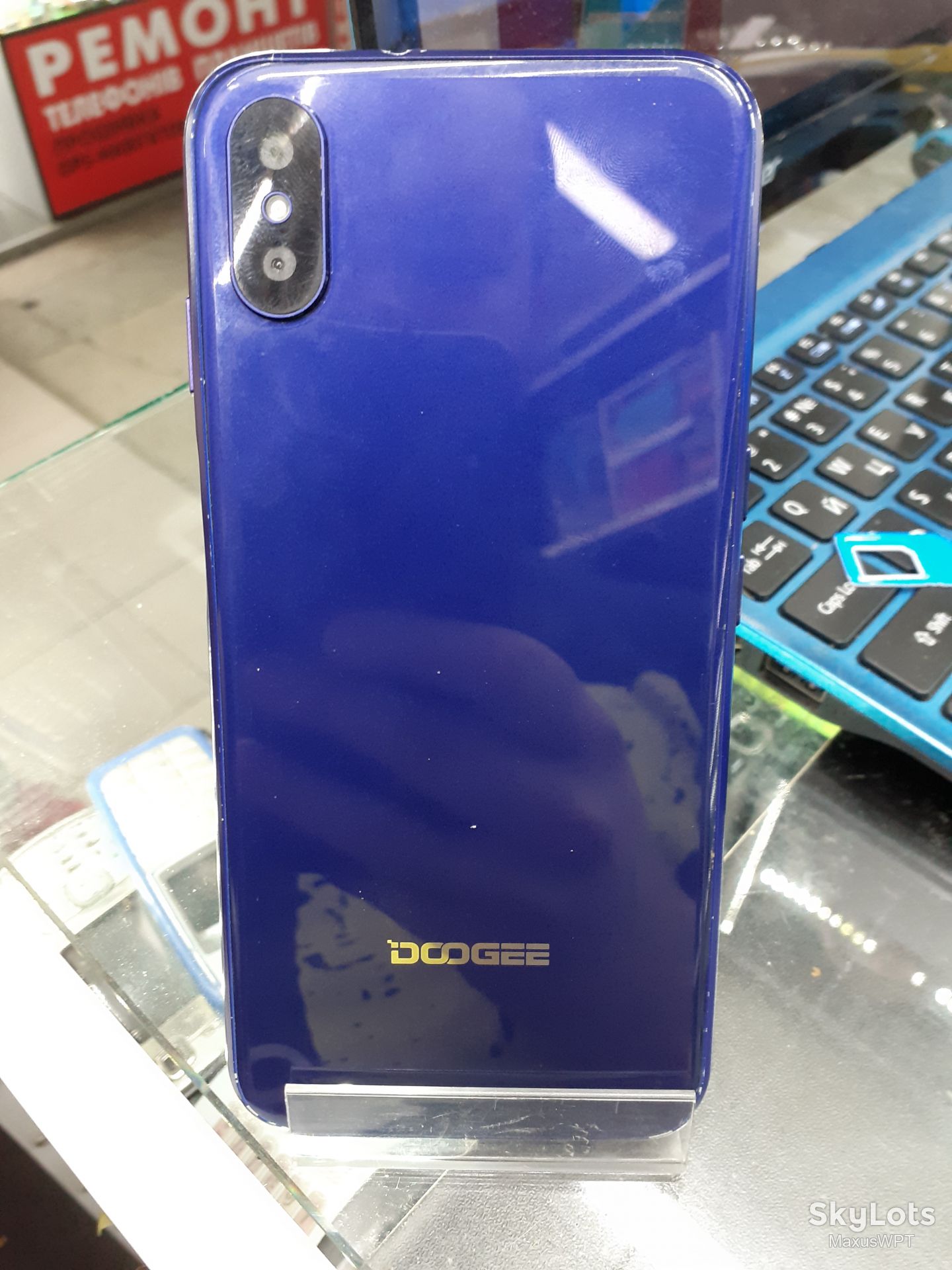 #1233 sklad DooGee X55 blue - фото фото фото 2