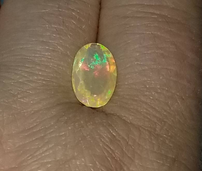 Эфиопский опал 2.06 Ct   12.60 x 7.80 x 4.80 MM - фото фото фото 6