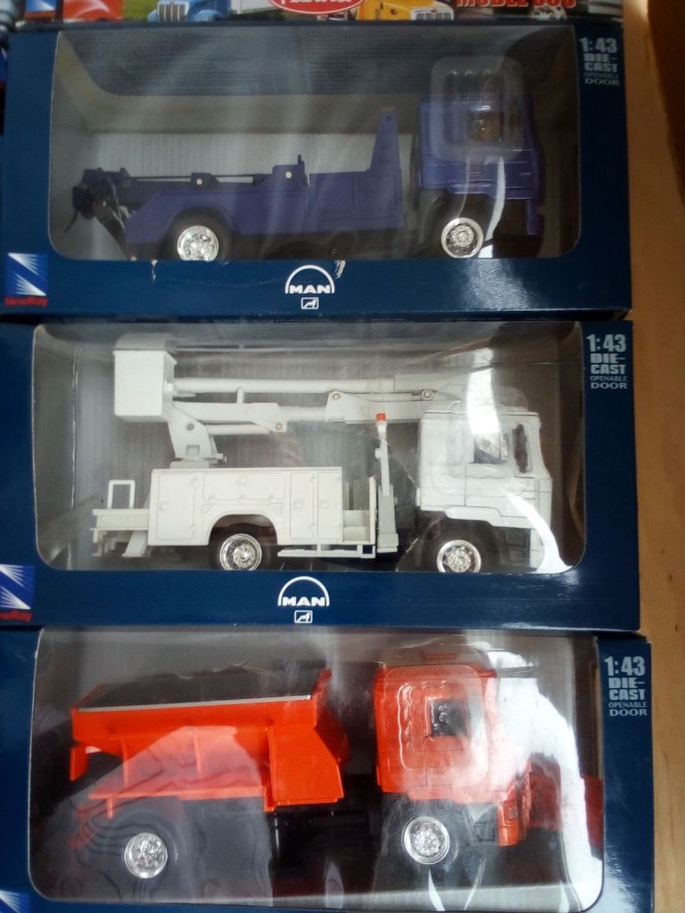 Вантажівки New Ray моделі 1:43 Peterbilt MAN - фото фото фото 4