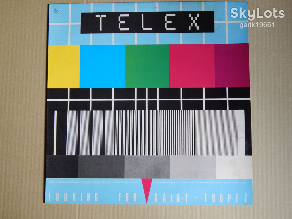Telex - Looking For Saint Tropez  (RKM – 10.011, Portugal) NM-/NM- - фото фото фото 0